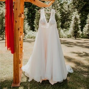 Size 26 wedding dress only worn for 3 hours.